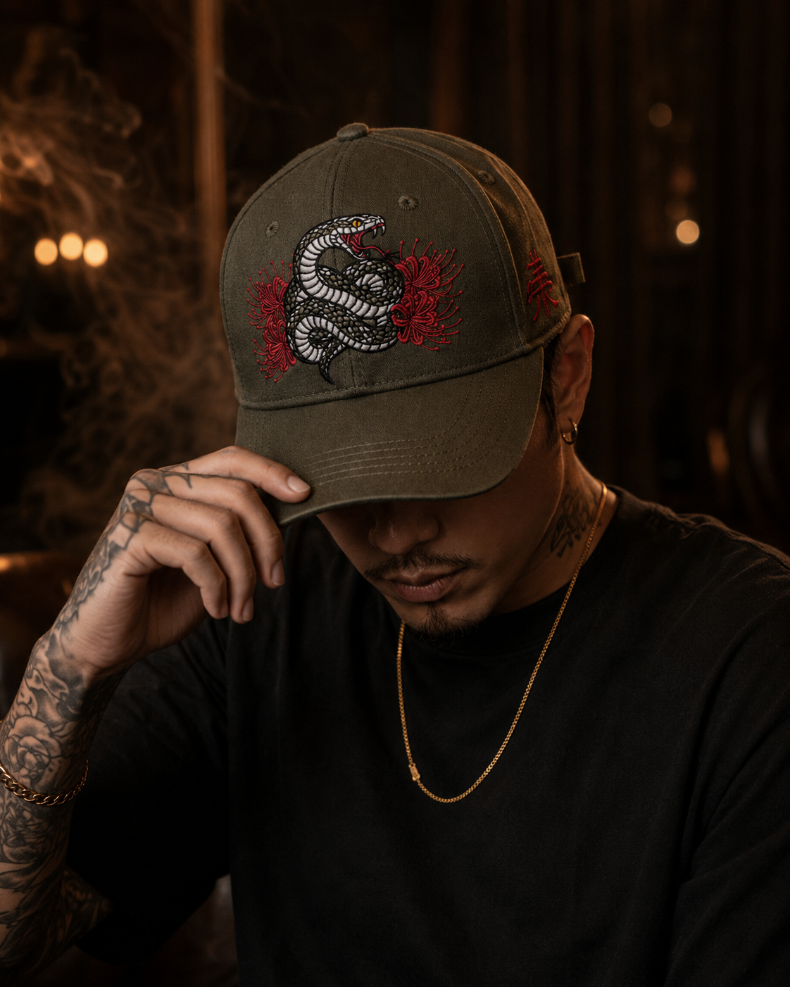 Serpent Bloom Embroidered Cap in charcoal grey with coiled serpent and red spider lily embroidery