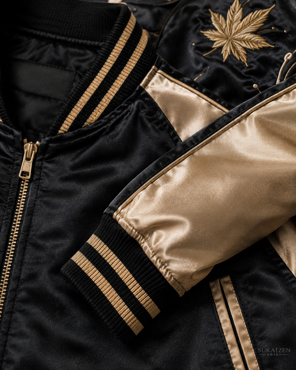 Golden Koi Cascade Sukajan Jacket by Sukaizen in black with gold sleeves and koi fish wave embroidery