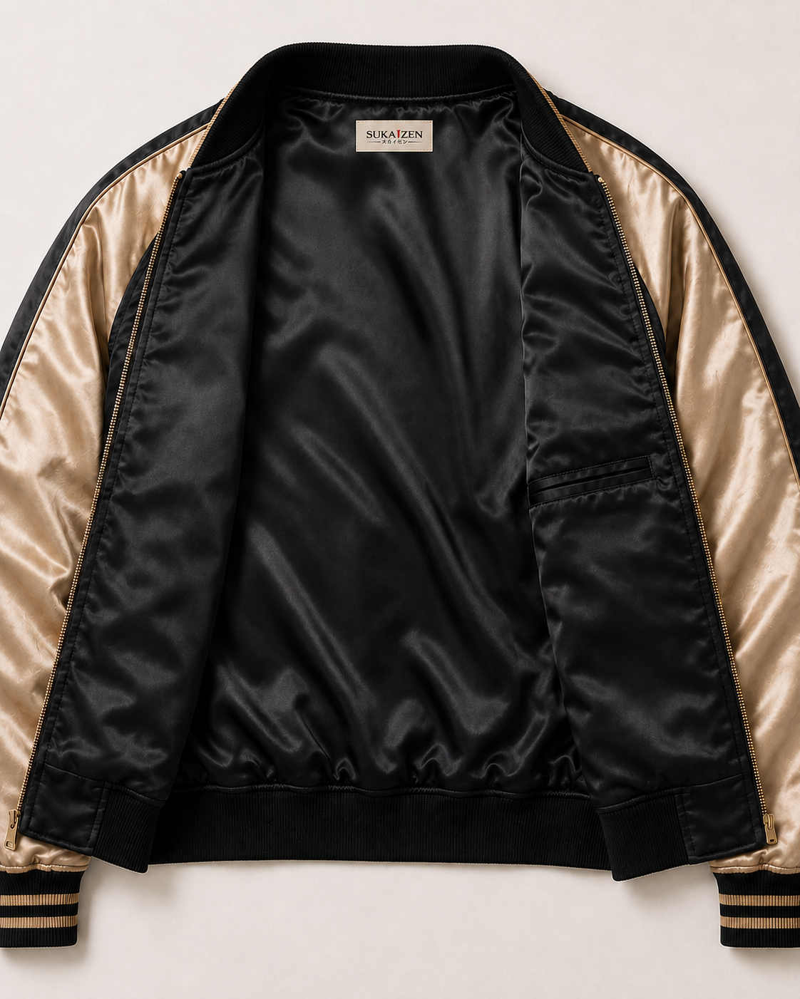 Golden Koi Cascade Sukajan Jacket by Sukaizen in black with gold sleeves and koi fish wave embroidery