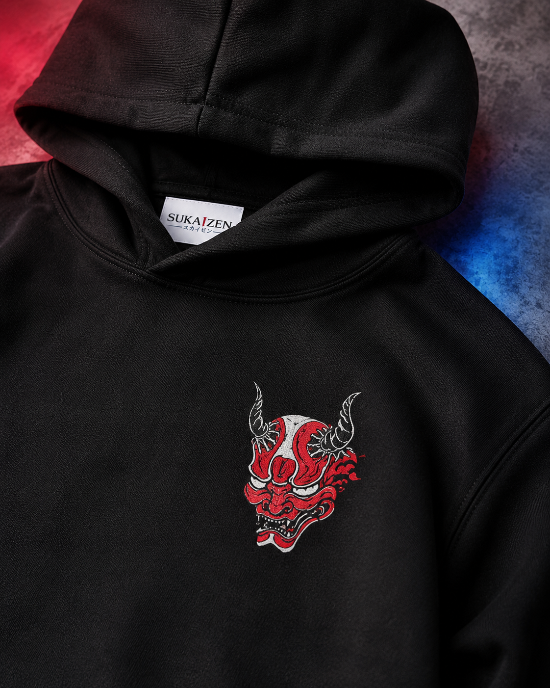Oni Wave Shadow Hoodie by Sukaizen in black with red oni mask, Japanese wave, cloud, and symbol artwork