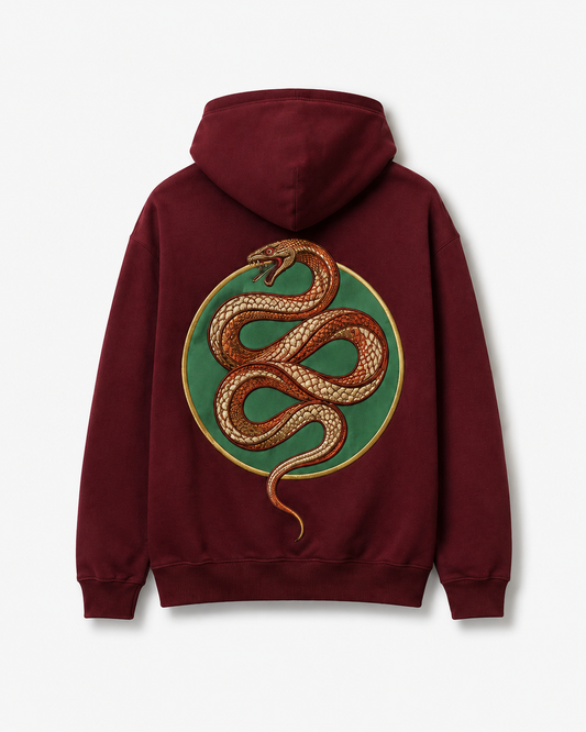 Emerald Serpent Coil Hoodie by Sukaizen in burgundy red with snake fang chest embroidery and large serpent back design