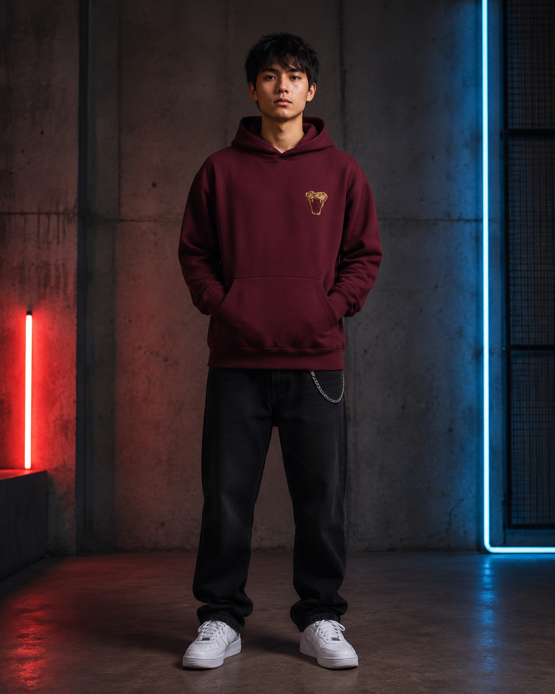 Emerald Serpent Coil Hoodie by Sukaizen in burgundy red with snake fang chest embroidery and large serpent back design
