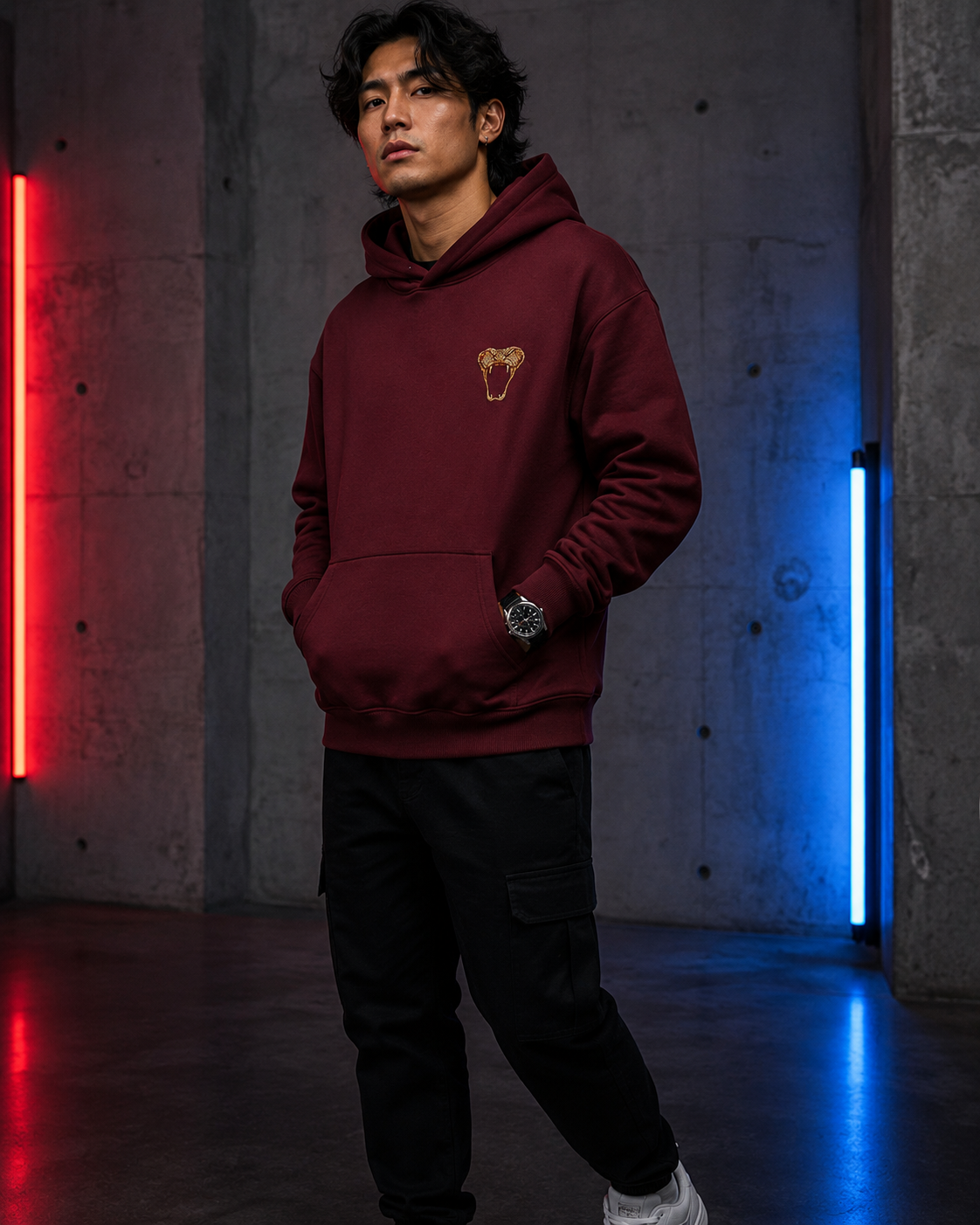 Emerald Serpent Coil Hoodie by Sukaizen in burgundy red with snake fang chest embroidery and large serpent back design