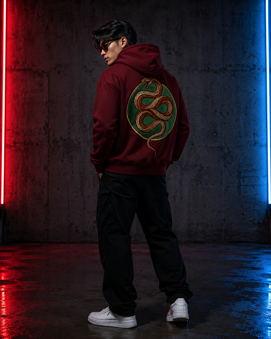 Emerald Serpent Coil Hoodie by Sukaizen in burgundy red with snake fang chest embroidery and large serpent back design