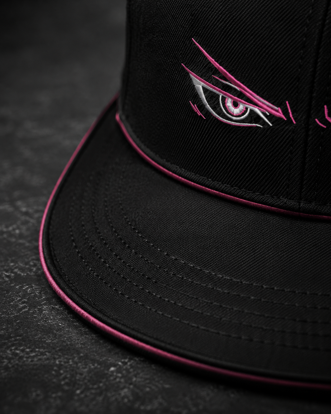 Shadow Anime Eyes Embroidered Cap in black with pink and white anime eye embroidery and flat brim