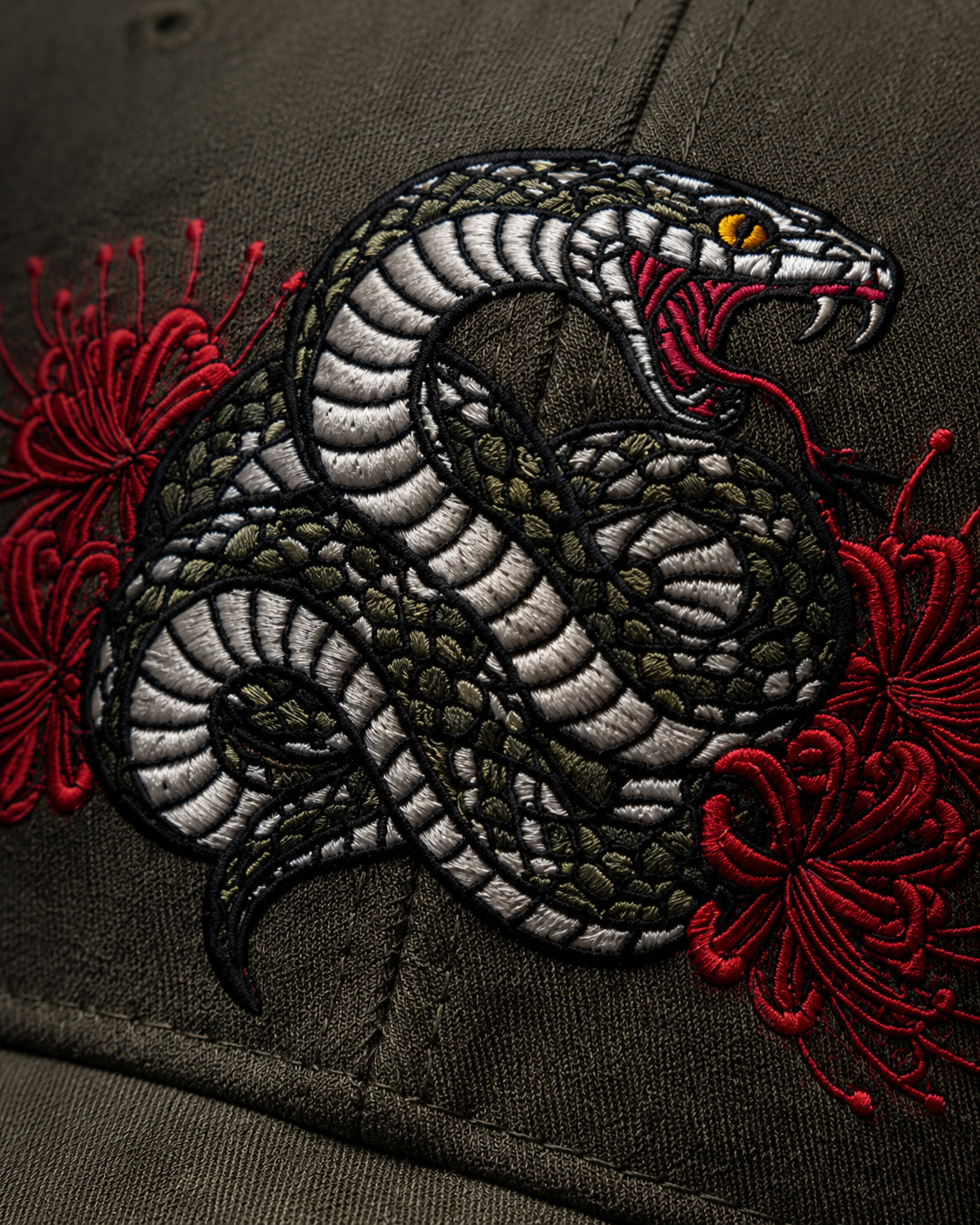 Serpent Bloom Embroidered Cap in charcoal grey with coiled serpent and red spider lily embroidery